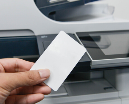 Person using proximity card for enhanced print security