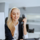 Front view of caucasian woman on phone in office