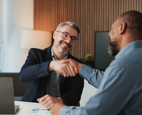 Shaking hands, agreement and business men in office for finance partnership